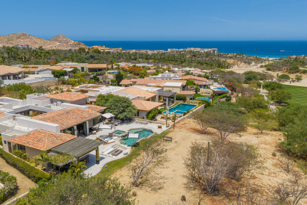 Los Cabos Brisas Discover Naah Payil, an exceptional estate where the warmth of a Contemporary Mexican Hacienda blends seamlessly with the relaxed sophistication of coastal living. Located within one of Los Cabos' most exclusive and secure communities, this architectural masterpiece was custom-designed by MCA, led by renowned architect Antonio Carrera. Thoughtfully enhanced in 2015 and again in 2025, the residence beautifully balances timeless character with today's highest standards of comfort and design. At the heart of the home, a central courtyard anchored by a signature tree creates a tranquil gathering space filled with natural light. The home's thoughtful design embraces effortless indoor-outdoor living. Open the grand living room doors, and refreshing ocean breezes naturally flow throughout the residence, creating a comfortable and inviting atmosphere – 12 Cabo del Sol Brisas, Cabo Corridor, BS