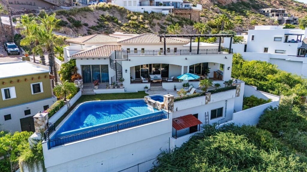 Los Cabos Cabo Colorado Architectural Elegance & Split-Wing Layout.This home is a triumph of modern architecture, beautifully finished with gorgeous marble floors throughout and premium granite countertops.A Grand Welcome: A generously sized entry foyer warmly ushers you into the home, setting a tone of spacious elegance from the very moment you arrive.Open-Concept Living: The main living room features dramatic vaulted ceilings, creating a grand, airy atmosphere. Sliding doors in both the living and dining room offer a seamless transition to the pool and outdoor deck while framing spectacular ocean – 8, Villa Ocho, San Jose Corridor, San Jose Corridor, BS